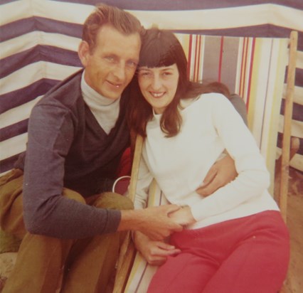 Diane and Eddie relaxing on a beach 1971