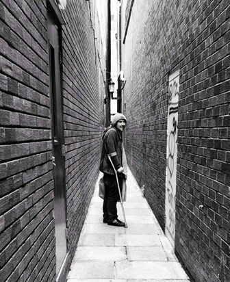 Stevie on one of the world's narrowest streets, Parliament Street, Exeter. August 21