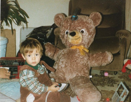 What a big Teddy and cute dungarees!