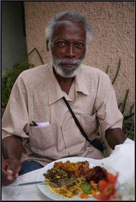 Daddy Eating at a Family Gathering.  Photo by R. Amissah