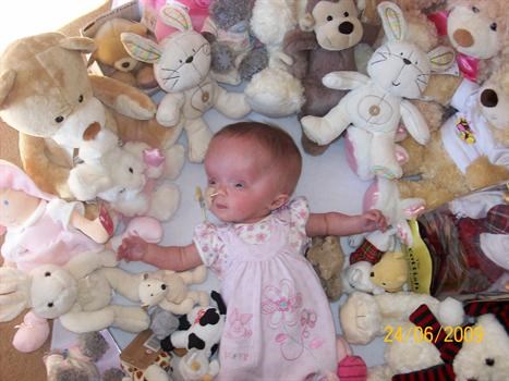 With all of her teddies