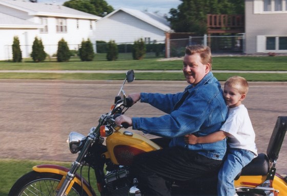 Tarlin and Dad on the Harley
