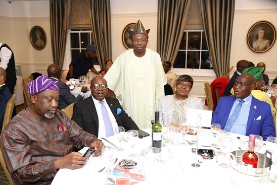 Enjoying company of old school mates, Rev. Dr. Olufemi Idowu in purple cap, at the Annual Dinner event of Olivet Baptist High School, Oyo, in London