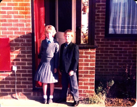 Age 11 with Lisa. His first day at middle school.