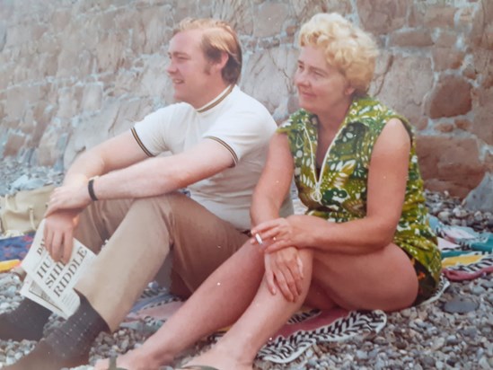 Dad and Grandma on beach