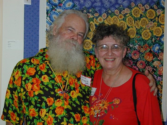 David and Nola among sunflower, Spring 2005