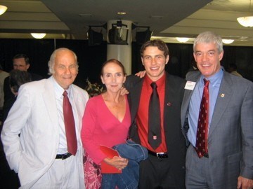 Marty with his son, Jared; Jared's mom, Jan; and a college official at Jared's college graduation