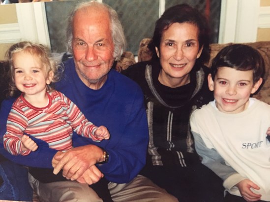 Marty with Gloria and his grandchildren, Julia and Justin