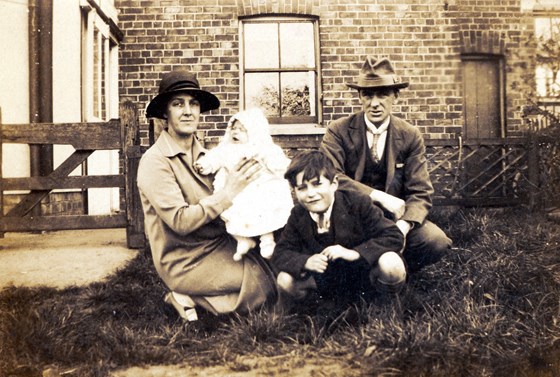 Mum with her mother, father and brother Gordon, Easter 1928