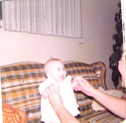 My favorite photo of Mom and me as a baby--do you see the huge smile on her face?