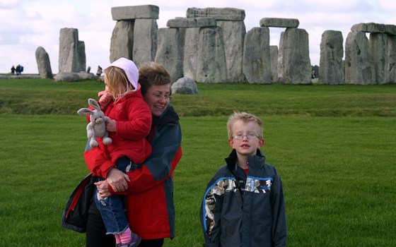 Pam and her grandchildren at Stone Henge 
