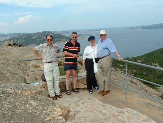 Justin with Mum, Dad and Rupert in Sardinia.