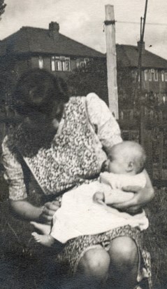 With his mum Maud 1946