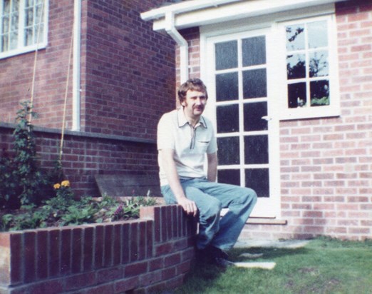 John on garden wall he built at Denton Close in 1980s