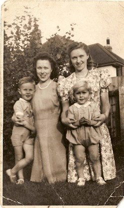 Uncle Denis with his brother Ian and half-sisters Mary and Phi (my Mother) taken approx 1942 in their Southborne garden