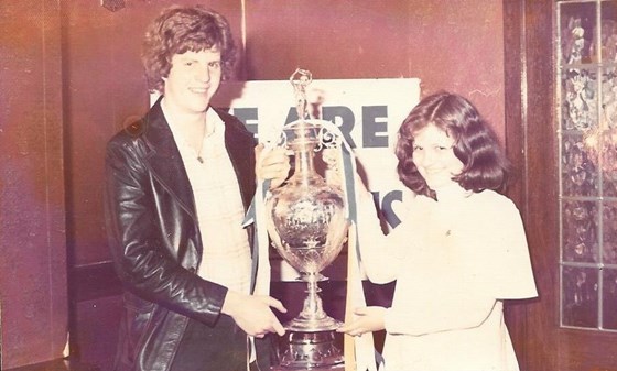 Julie and Stephen lifting the First Division trophy in the Beulah Arms (1974)