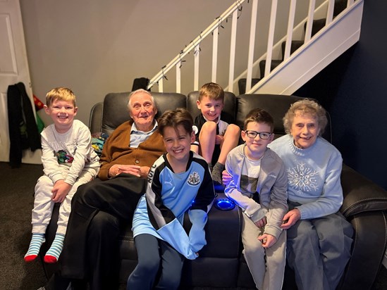 Grandad with Nan and 4 of his great grandsons at Christmas 2021