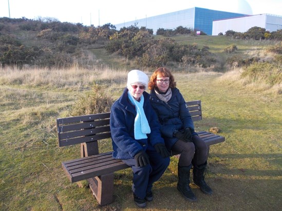 Shirley and Mary at Dad's bench at Sizewell.