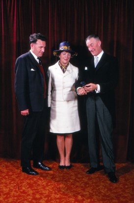 Frank Skelcher receiving his OBE, with Ivy and Barrie