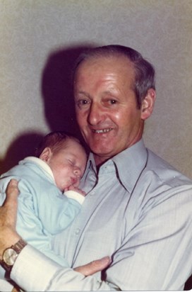 Me (grandson Jonathan) as a baby with my Grandad. 