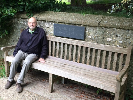 John on church bench