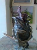 A wee sculpture for Tosh made by John,A baby dragon being born for your chalice Tosh xx
