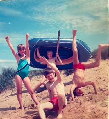 Family on beach Old Hunstanton