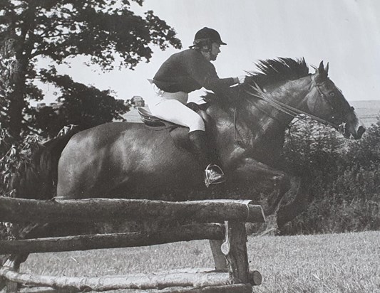 Brenda taking a fence