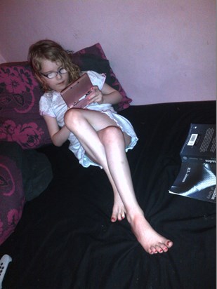 orla doing her favourite thing - playing on her nintendo 3ds