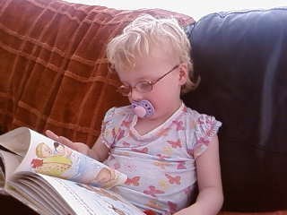 orla doing a bit of reading - aged 3