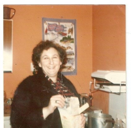 mum making up milk for dawn Oct 1976