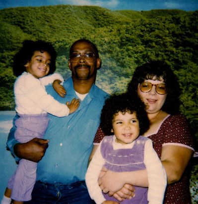 Victor with his two youngest daughters: Carmel (left) and Candace (right) and their mother Pam
