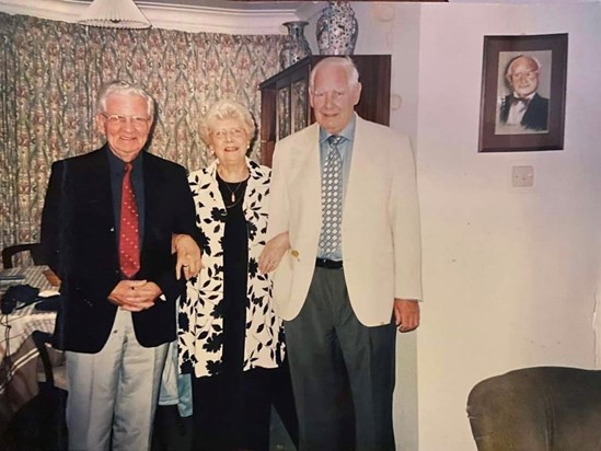 With her 2 older brothers Jim and Hugh. Plus picture of Husband John on the wall