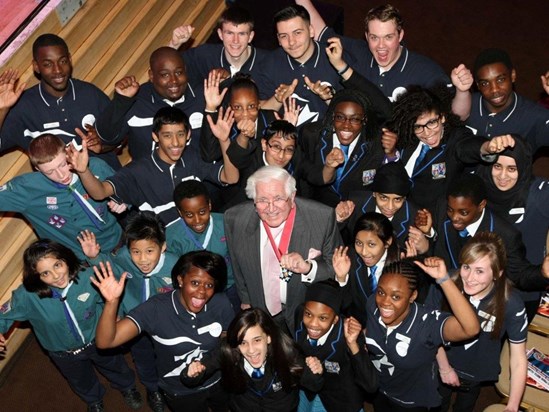 Sir Jack receives his CBE with young people from the Scouts and the JPF Achiever Network