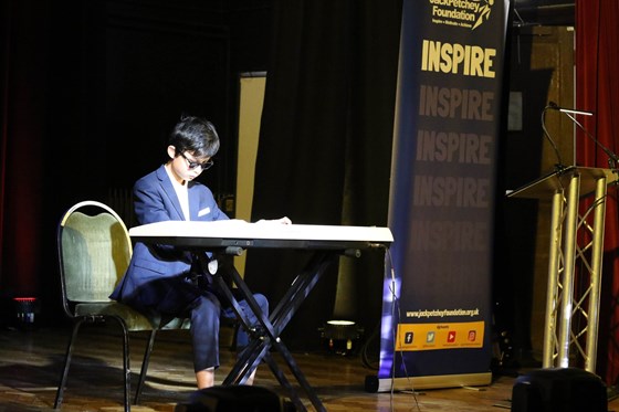 Thank you for creating this wonderful award. Rest in peace, Sir Jack Petchey.  Pictured: Chapman Shum receiving his award and performing at the Award Ceremony at Wandsworth Town Hall.