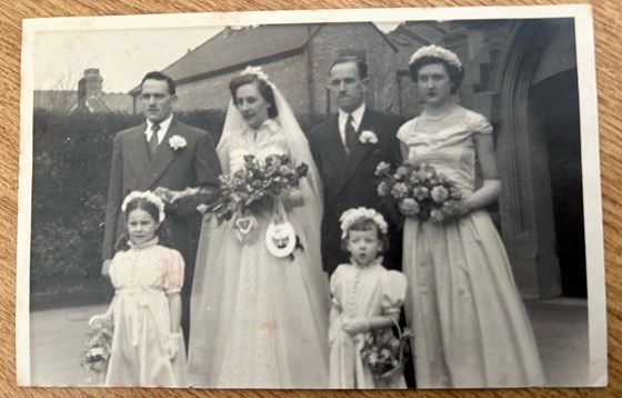 Mum and Dad on their Wedding day, with brother Vic as Best Man, and his wife Jill, with nieces Lynda Clare and Lesley Bradley as Bridesmaids. 20 March 1955