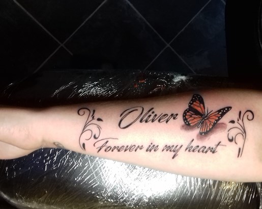 So proud of my tattoo for Oliver xxxxxx