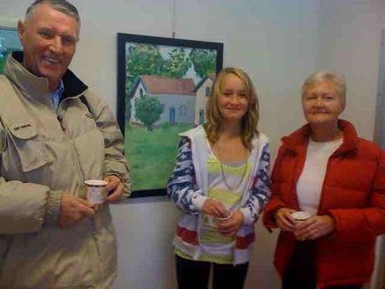 Mum and dad visit Kamilla's art exhibition.