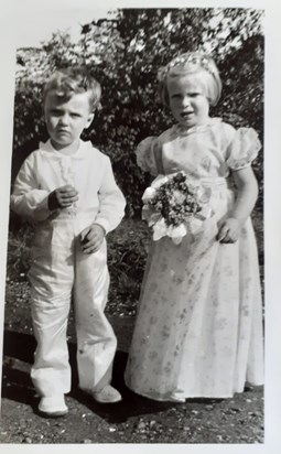 Michael and cousin Anne at Uncle Jack's wedding. August 1956