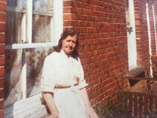 Pam outside her house in Cornfield Road