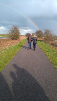 Loving Jeff and Amanda Walking Towards the Rainbow