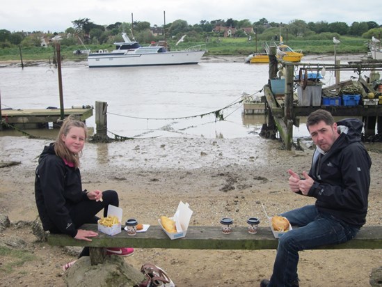 Dad and Daughter Fish and Chips by the Sea