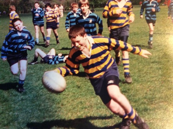 David playing rugby