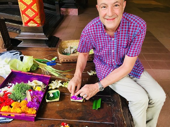 Dinos learning to make offerings in Bali
