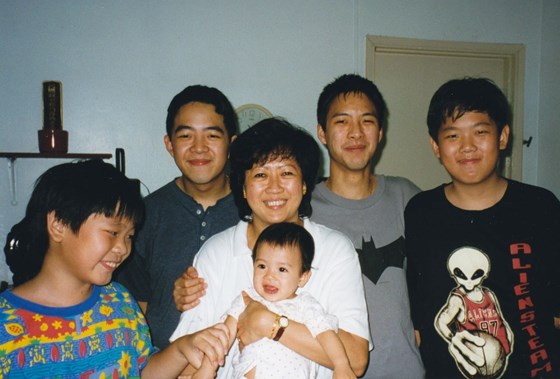 Holding Ashlyn with (L to R) Zhan, Kenny, Kelvin and Zhaun