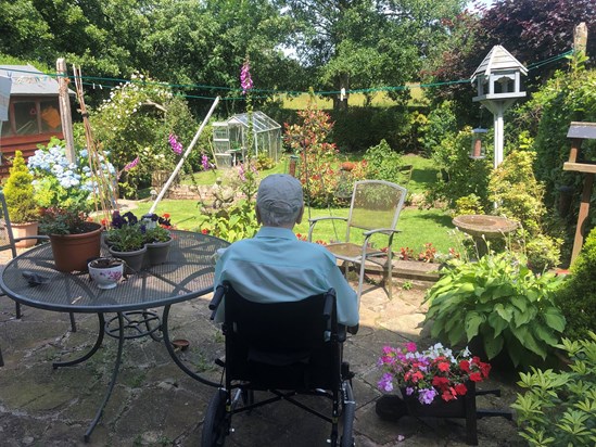he loved just sitting in the garden watching the birds and watering his precious flowers 