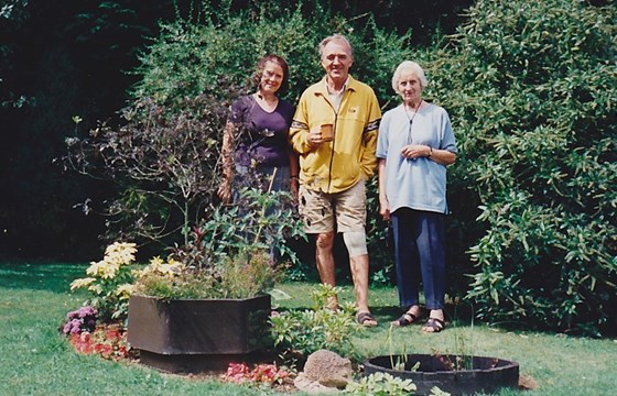 Ann Dawson, son-in-law, Colin and Peggy in her beloved garden