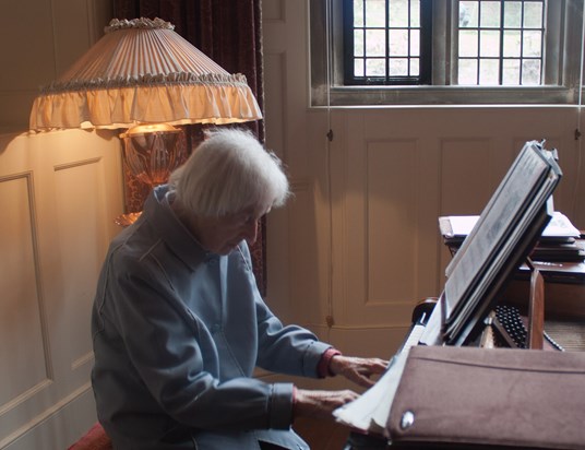 Peggy playing the Broadwood grand piano at Standen House in September 2017