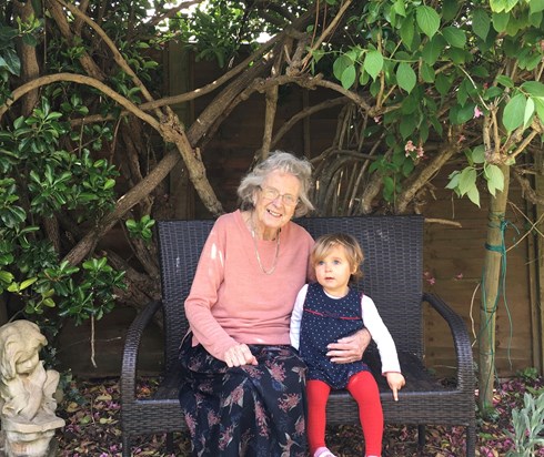 Grandma and Isla in her garden