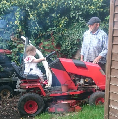 Demi and Grandad in the back garden